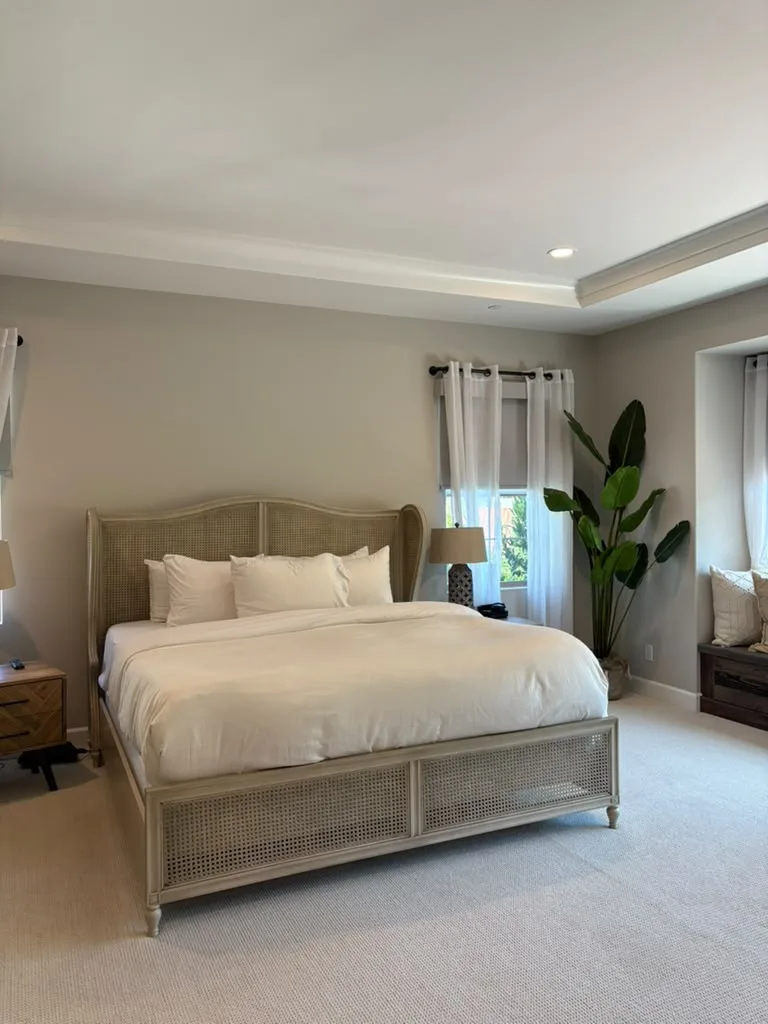 Master bedroom made up after a cleaning